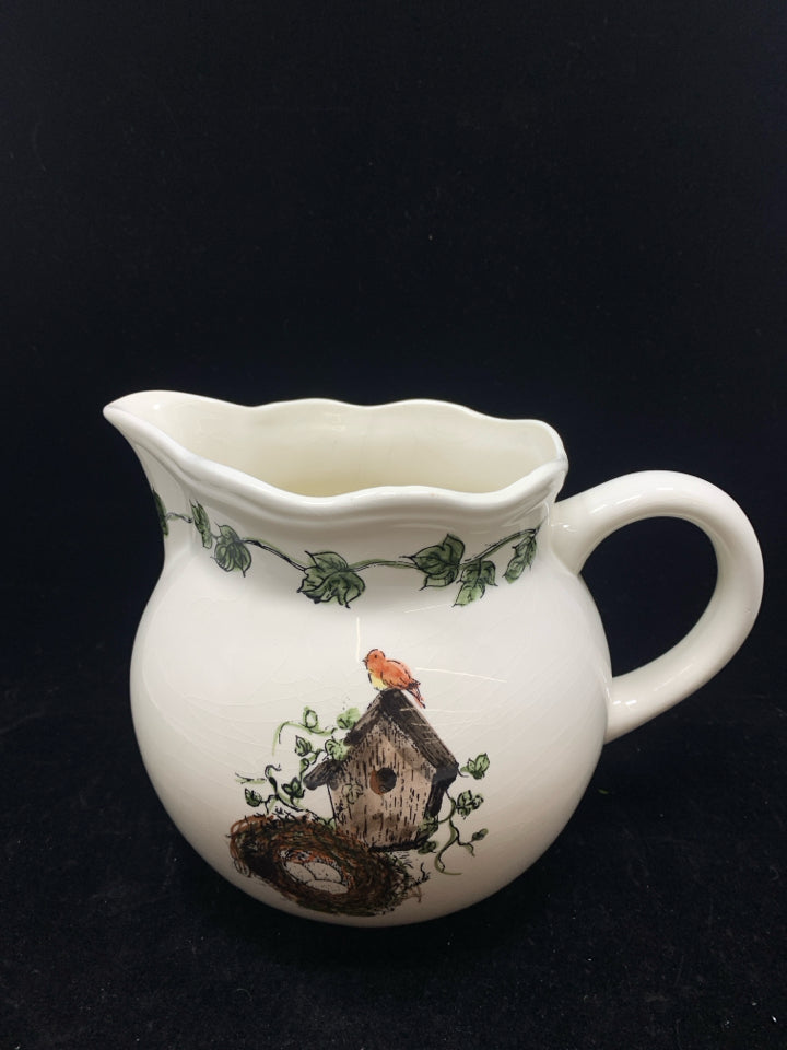 BIRDHOUSE AND NEST PAINTED CERAMIC PITCHER.