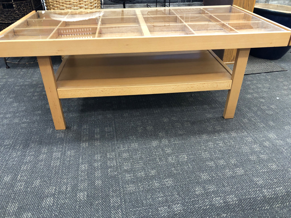 WOOD COFFEE TABLE W/ 18 SLIDE-OUT SLOTS & GLASS COVER.