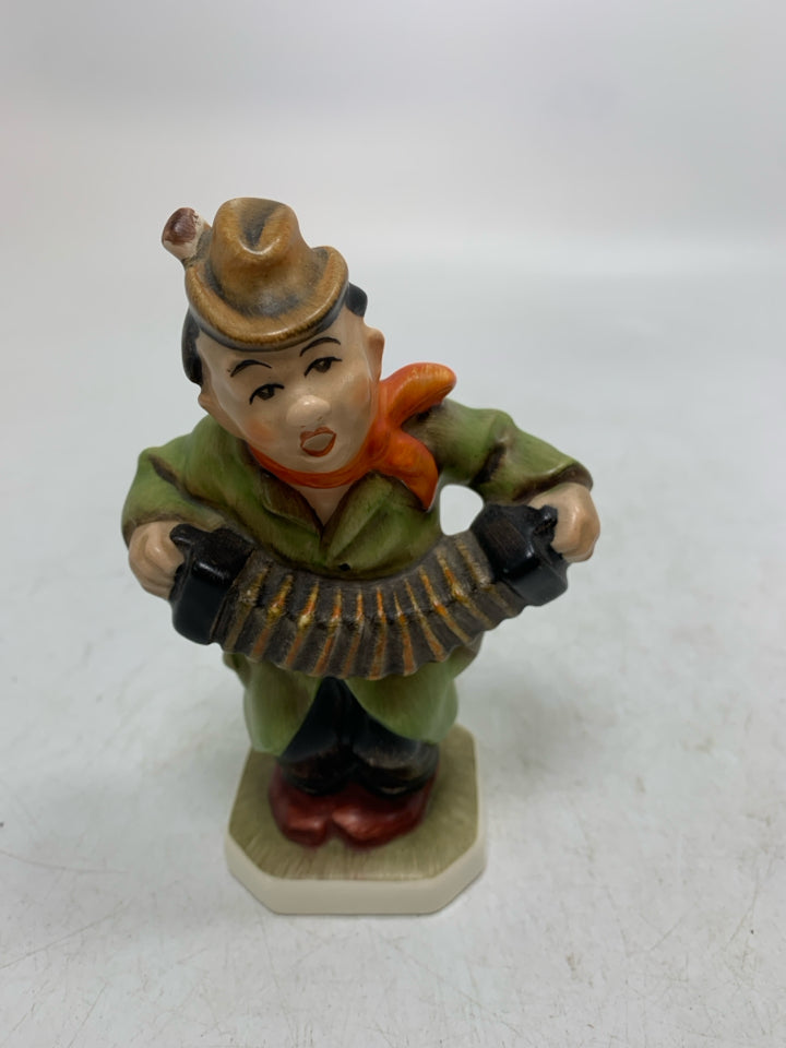 VTG FRIEDEL GERMAN GREEN COAT MAN PLAYING ACCORDION FIGURINE.