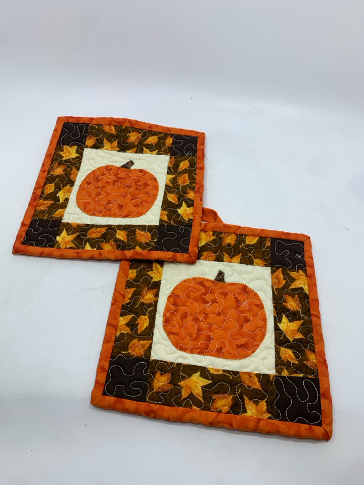 2 FALL STITCHED POT HOLDERS.