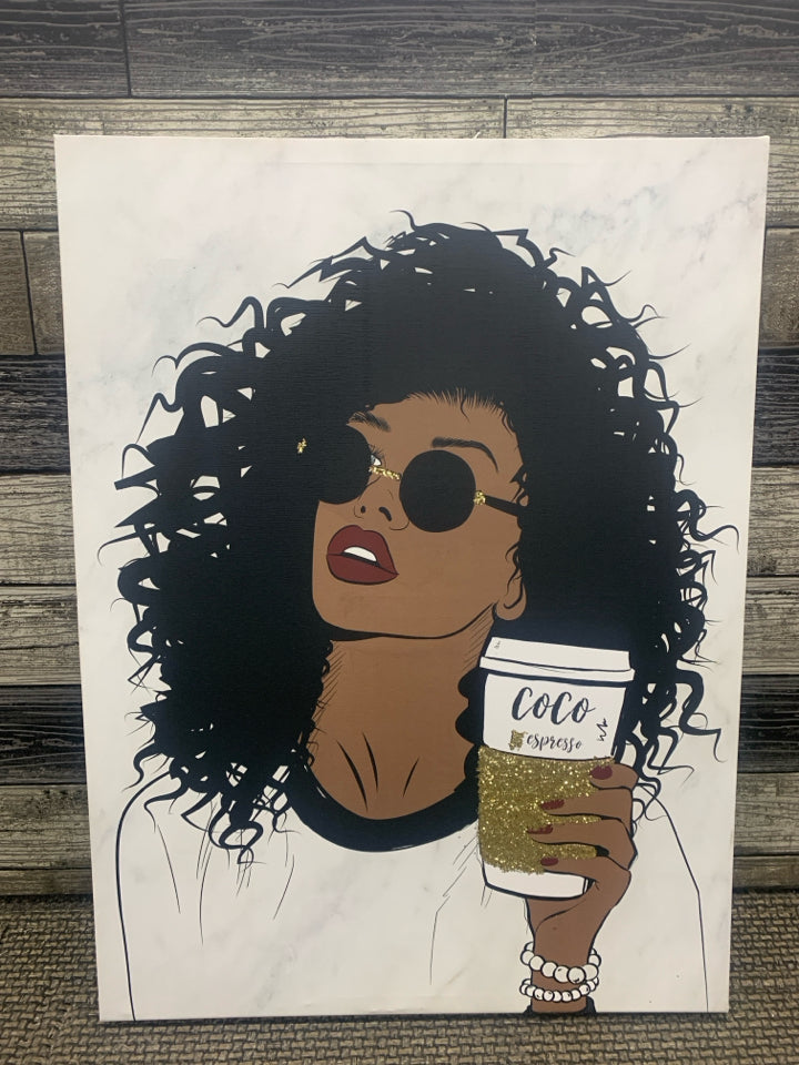 WOMAN HOLDING ESPRESSO CANVAS WALL ART.