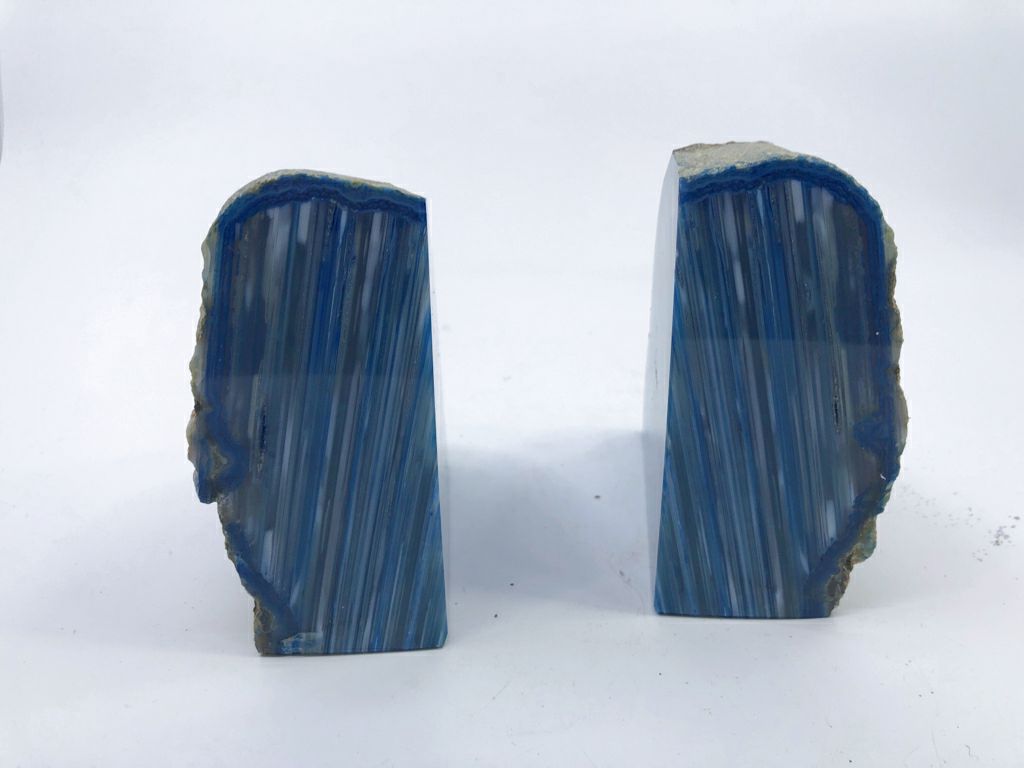 2 BLUE CUT ROCK BOOKENDS.