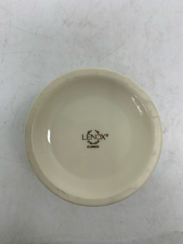 EMBOSSED TEA LIGHT HOLDER.