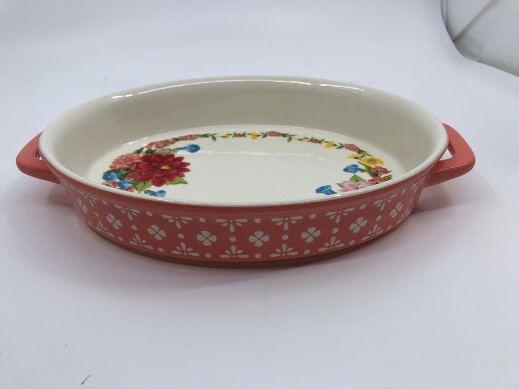 OVAL SALMON PINK FLORAL BAKING DISH W HANDLES.