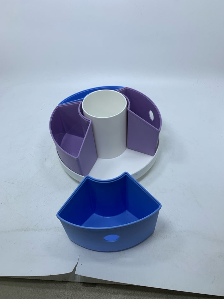 PLASTIC LAZY SUSAN W/ COLORFUL REMOVABLE SLOTS.