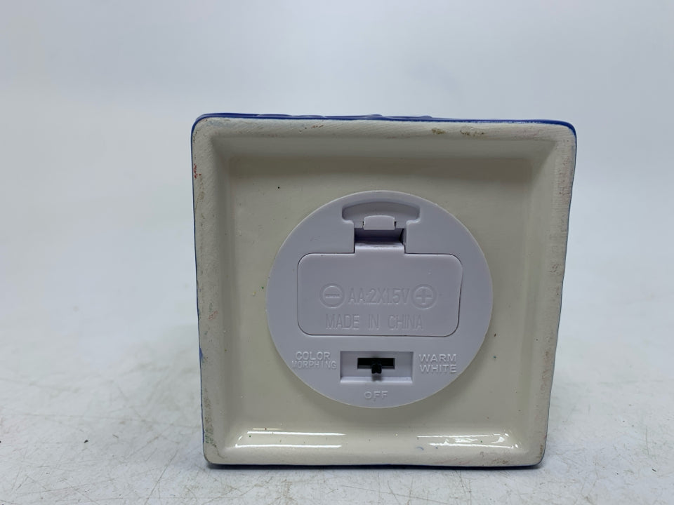 SQUARE PIERCED LIGHT UP CERAMIC ORNAMENT.