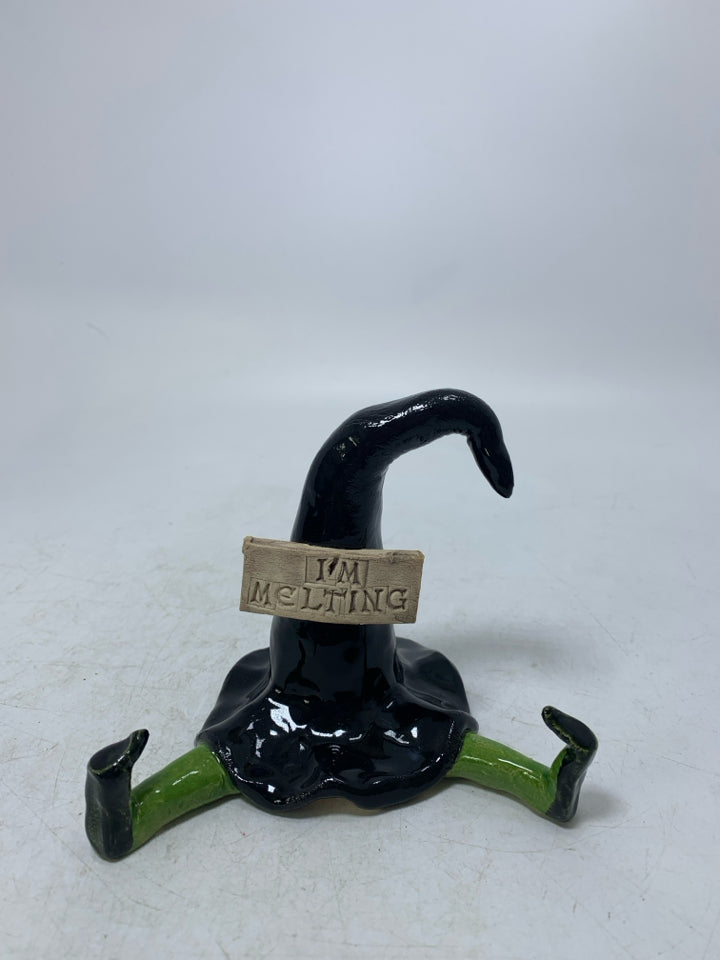 POTTERY WITCH HAT W/ GREEN LEGS IM MELTING FIGURE.