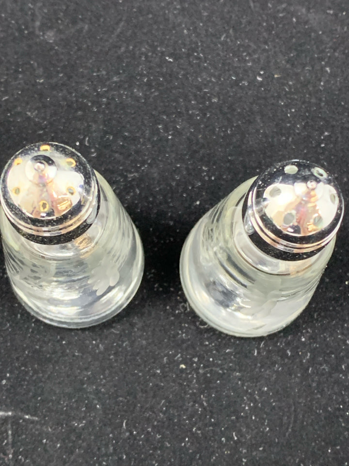 FROSTED FLOWER ETCHED GLASS SALT AND PEPPER SHAKERS.