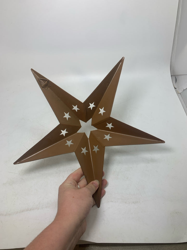 METAL STAR WALL HANGING.