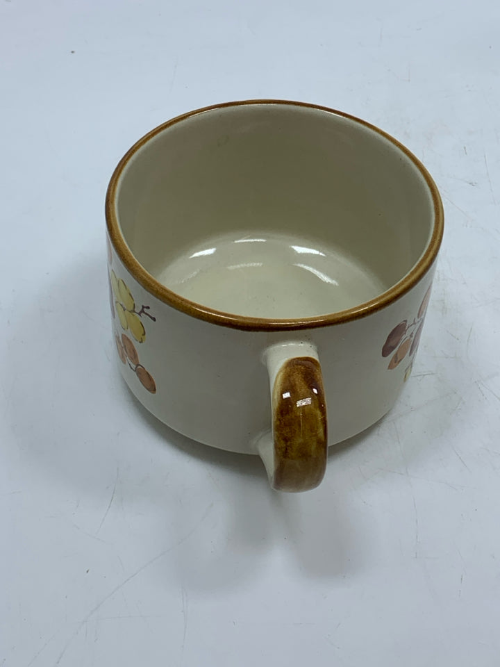 VTG TAN FLORAL MUG.