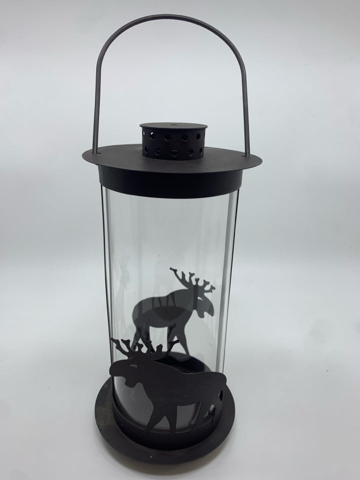 ROUND BROWN METAL MOOSE LANTERN W/CLEAR GLASS.