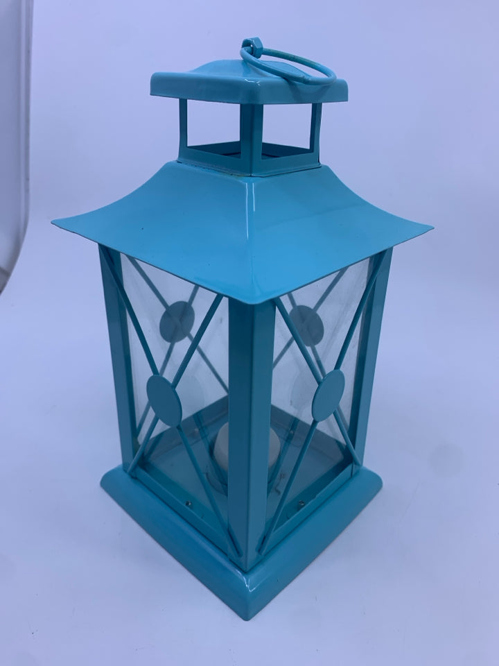 LIGHT BLUE METAL TEA LIGHT LANTERN.