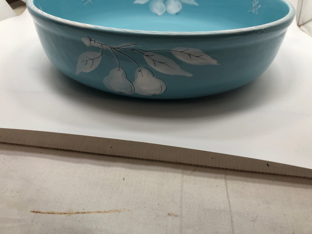 BLUE CERAMIC SERVING BOWL W/WHITE PAINTED FRUITS.