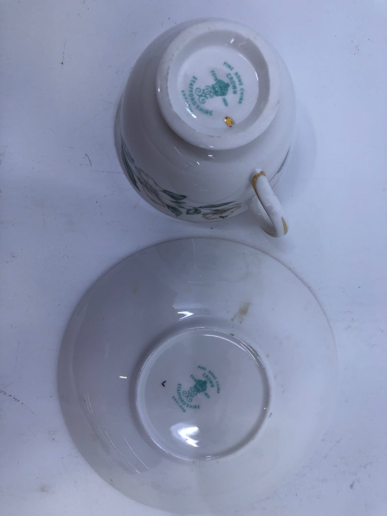 VTG WHITE FLORAL TEACUP AND SAUCER.