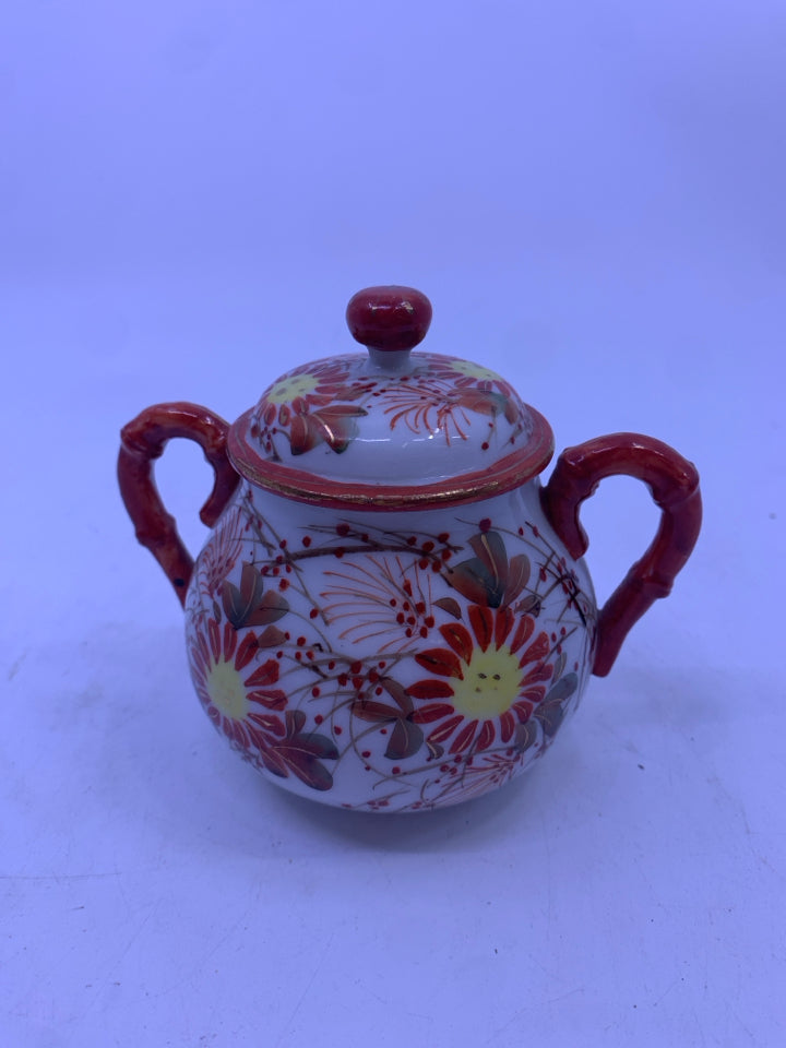 SMALL SUGAR BOWL ORANGE W/ FLOWERS.