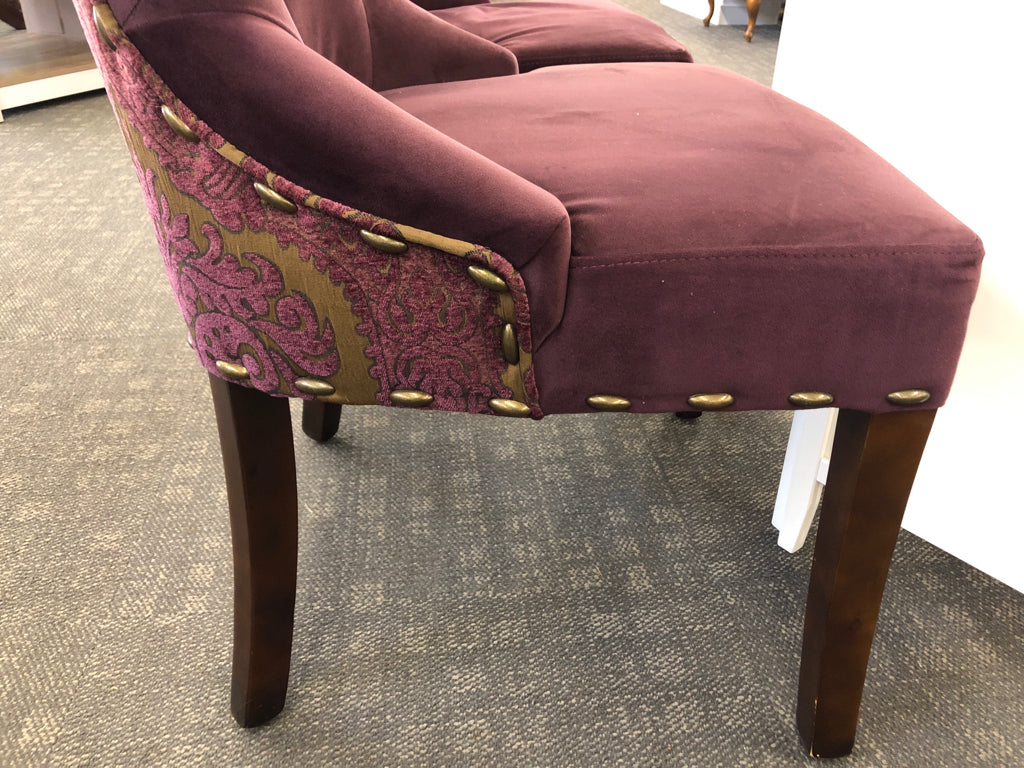 2 MAROON SUEDED CHAIRS W/PAISLEY DESIGN ON BACK & WOOD LEGS.