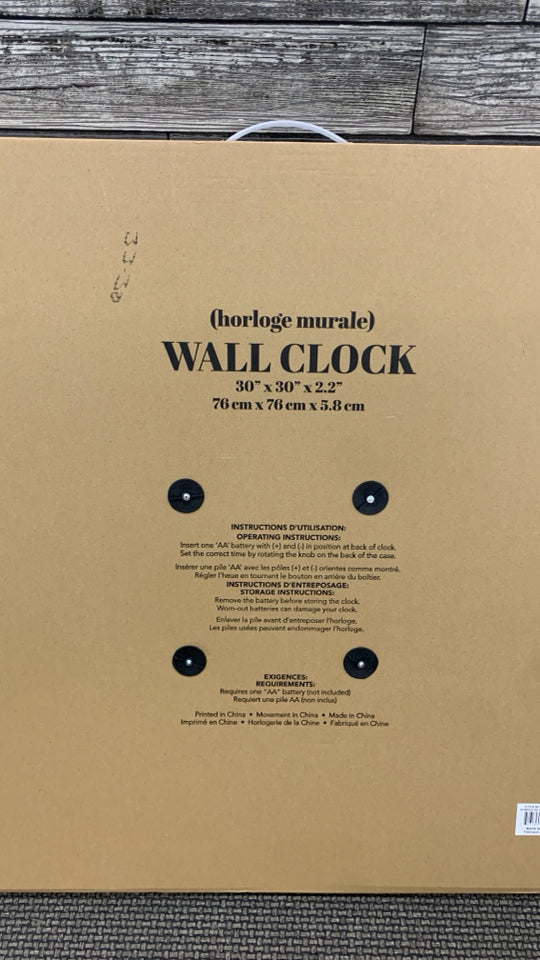 NIB WHITE WASHED PLASTIC WALL CLOCK.