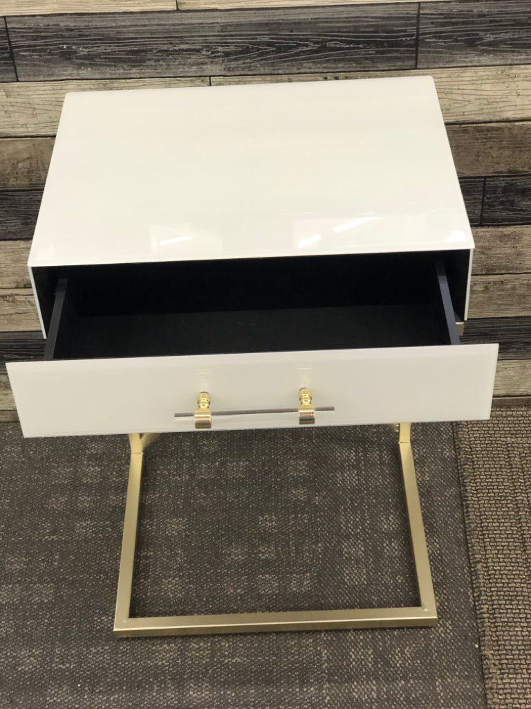 WHITE GLASS SIDE TABLE W/ DRAWER GOLD LEGS.