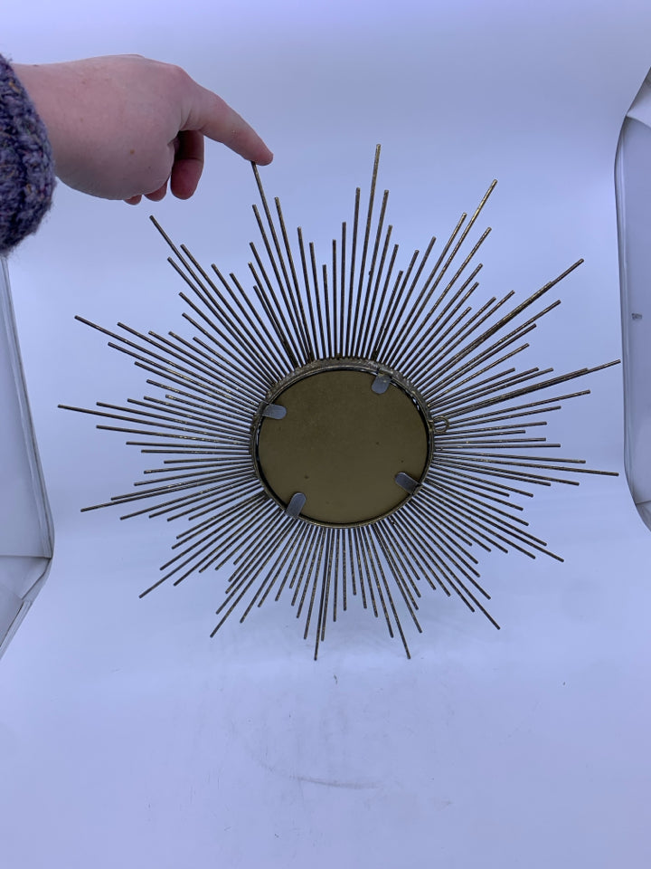 SILVER STARBURST MIRROR.