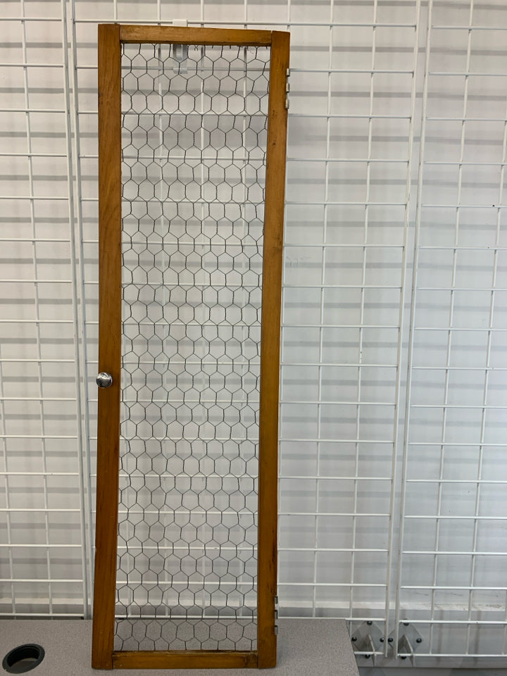 CHICKEN WIRE DECORATIVE DOOR.