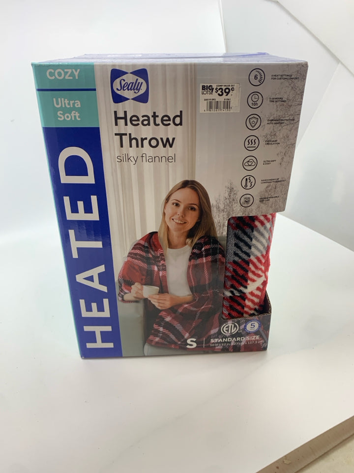 NIB HEATED THROW BLANKET.