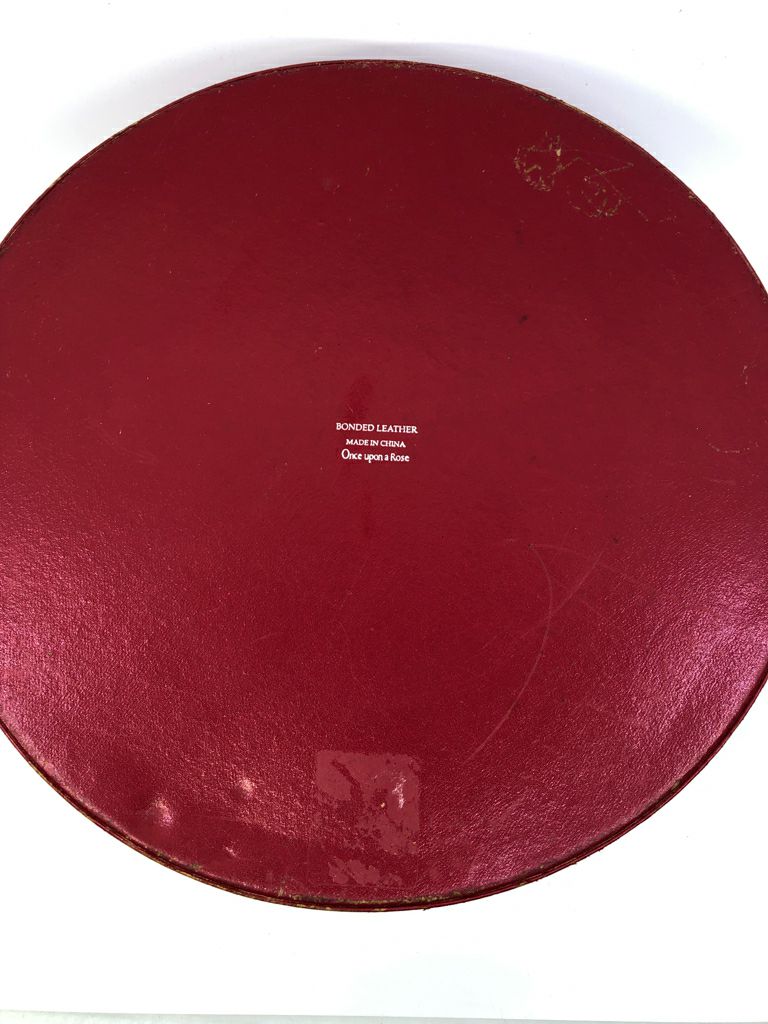 RED BONDED LEATHER HAT BOX.