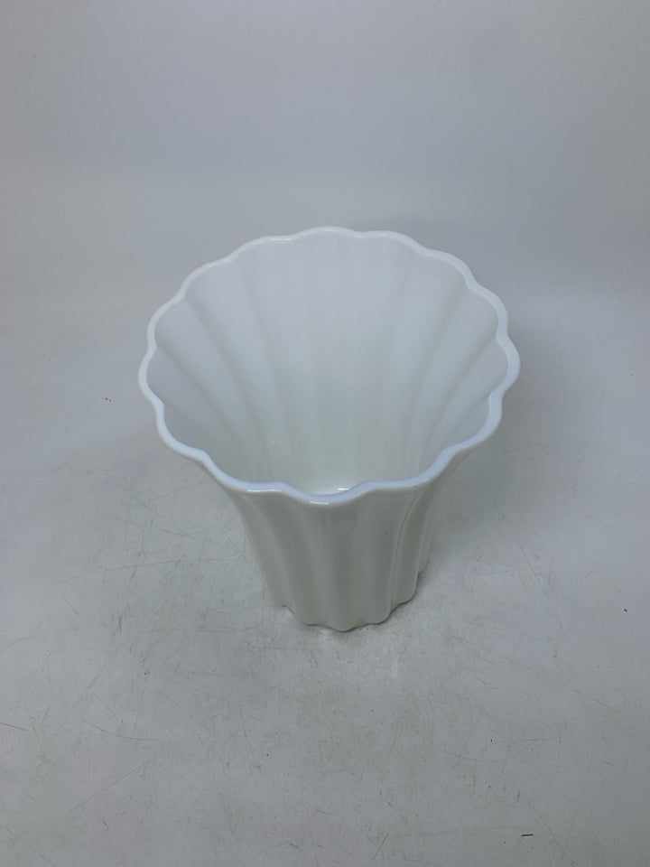RIBBED MILK GLASS VASE W/ FLARED TOP.