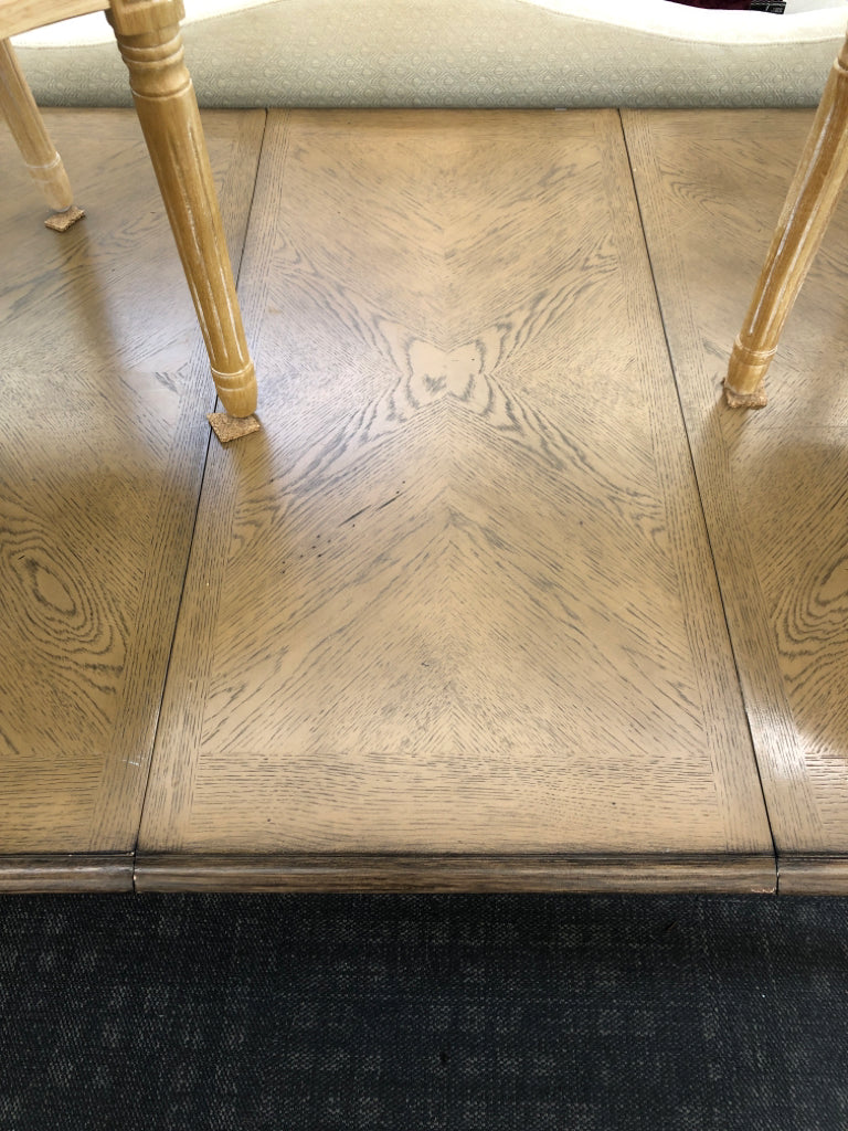 TABLE W/CREAM COLOR LEGS+ 4 WOODEN CHAIRS, + LEAF.