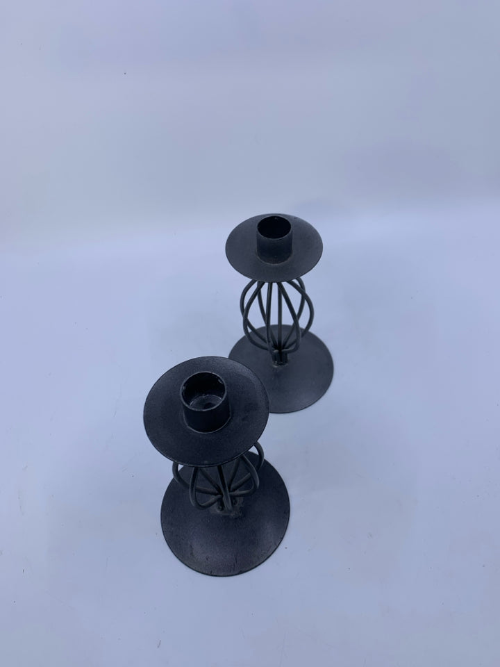 2 GREY METAL CHANGE LOOK TAPERED CANDLE HOLDERS.