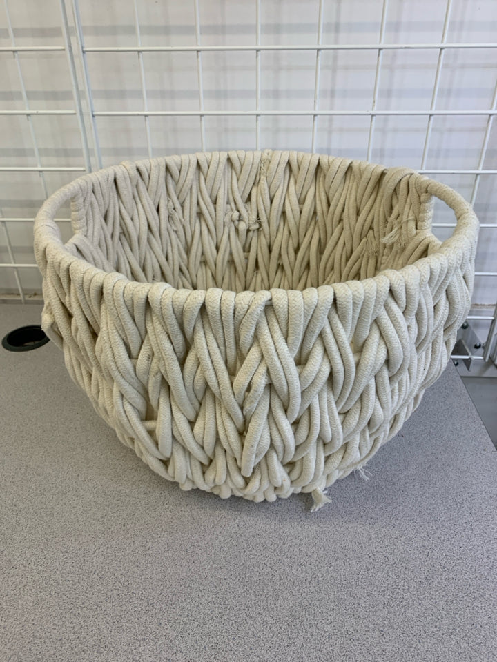 WHITE MACRAME ROUND STORAGE BIN.