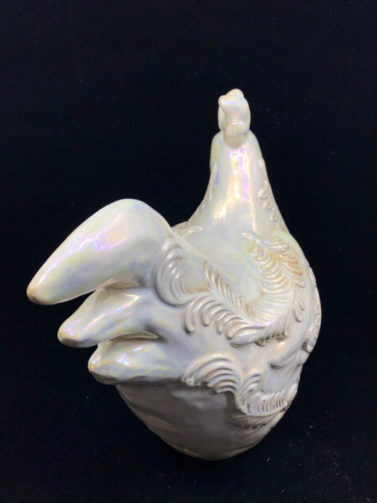 TALL WHITE IRIDESCENT ROOSTER.