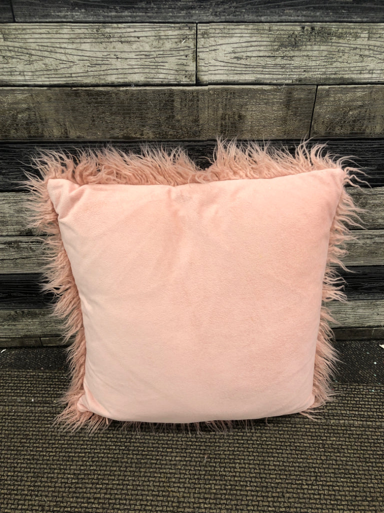 PINK SHAG PILLOW.