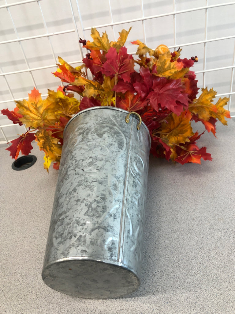 FALL FLORALS IN METAL PLANTER.