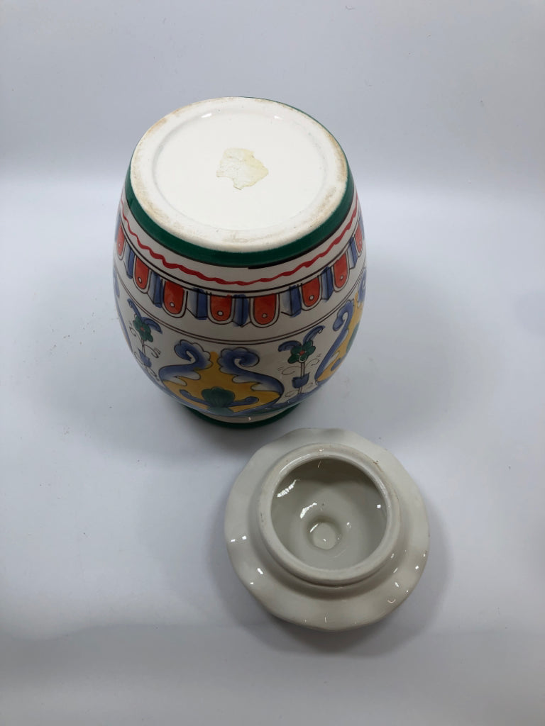 MULTI-COLORED BLUE/ YELLOW ROUNDED JAR.