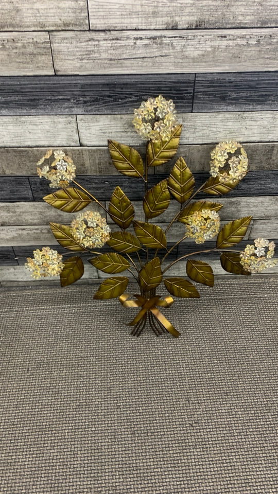 BEADED FLOWERS ON BROWN METAL LEAVES WALL HANGING.