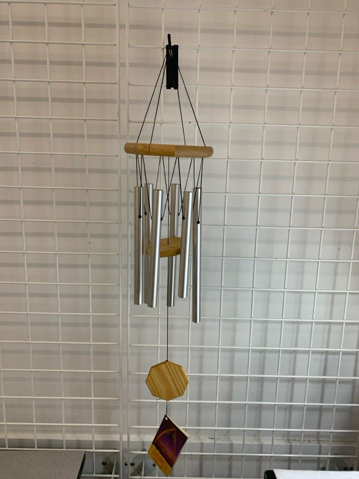 WOODEN WIND CHIME W/SILVER CHIMES.