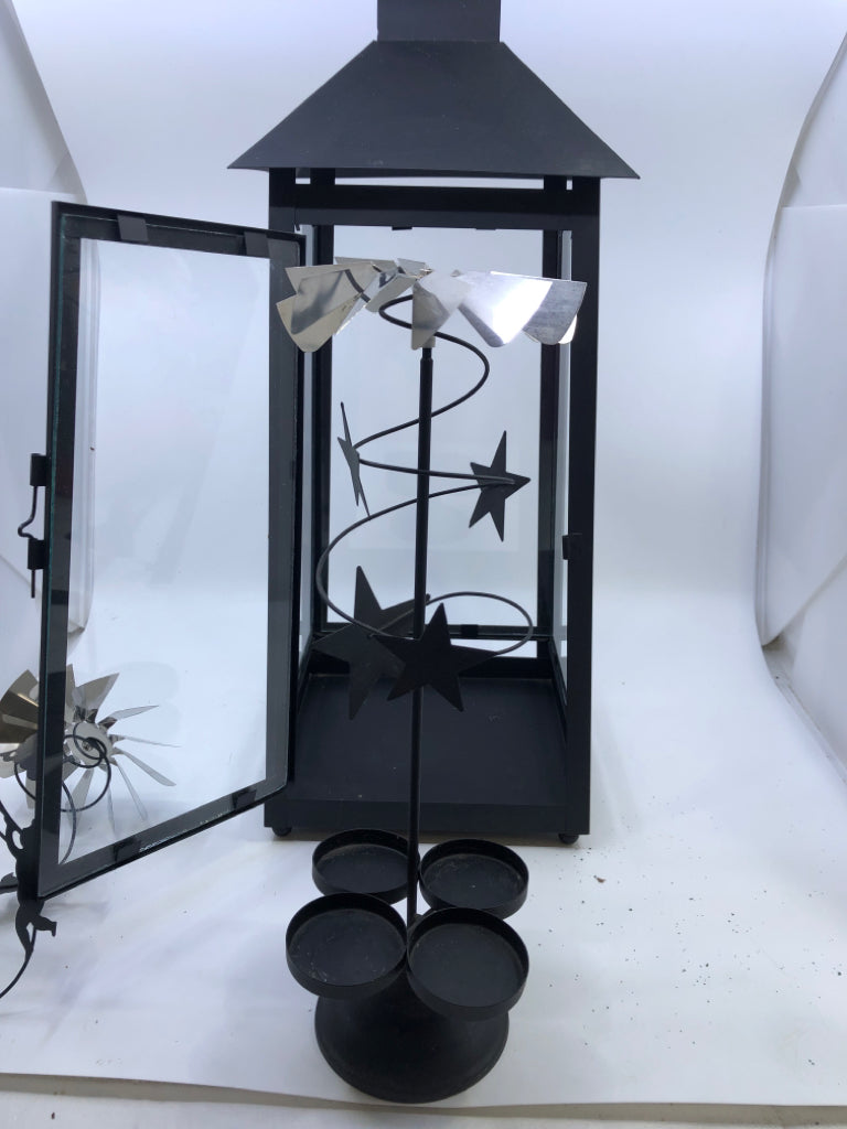 BLACK METAL TEALIGHT LANTERN WITH HOLIDAY OPTIONS .