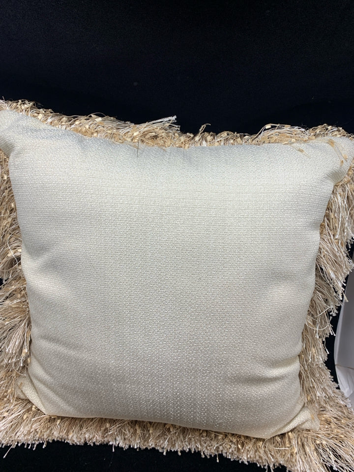 CREAM PILLOW W/TAN TASSEL FRINGE.