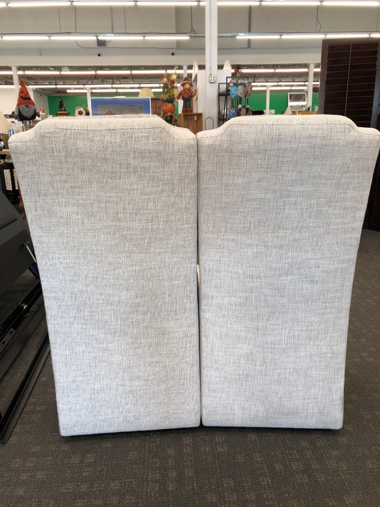 2 GREY WHITE ACCENT SLIPPER CHAIRS W WHEELS.