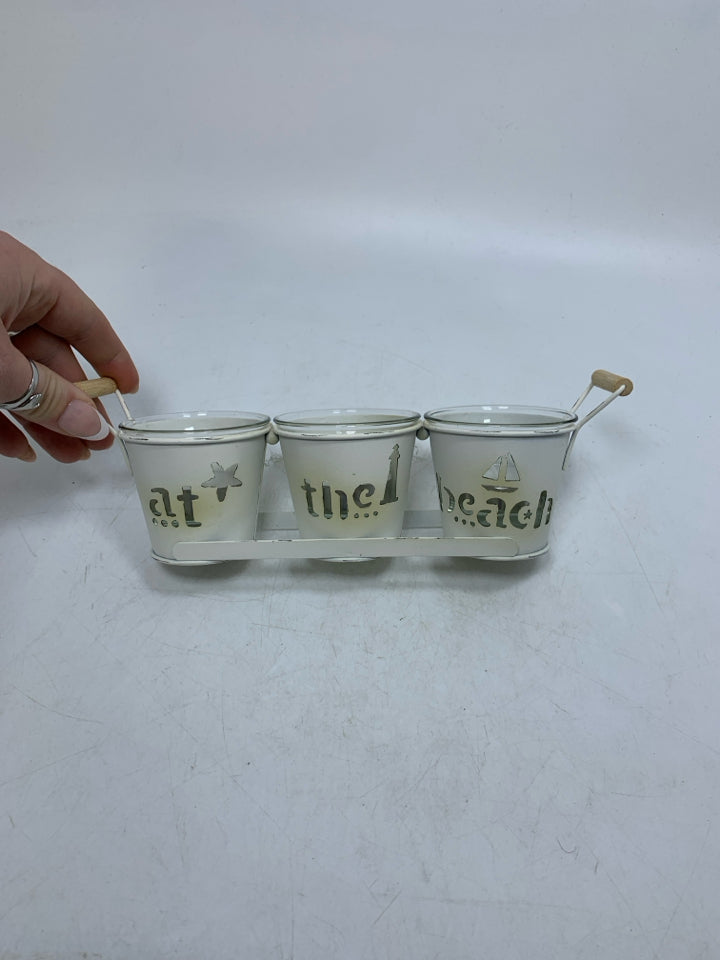 METAL AT THE BEACH TEALIGHT HOLDER.