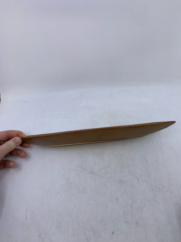 TAN SHALLOW TEAR DROP BOWL.