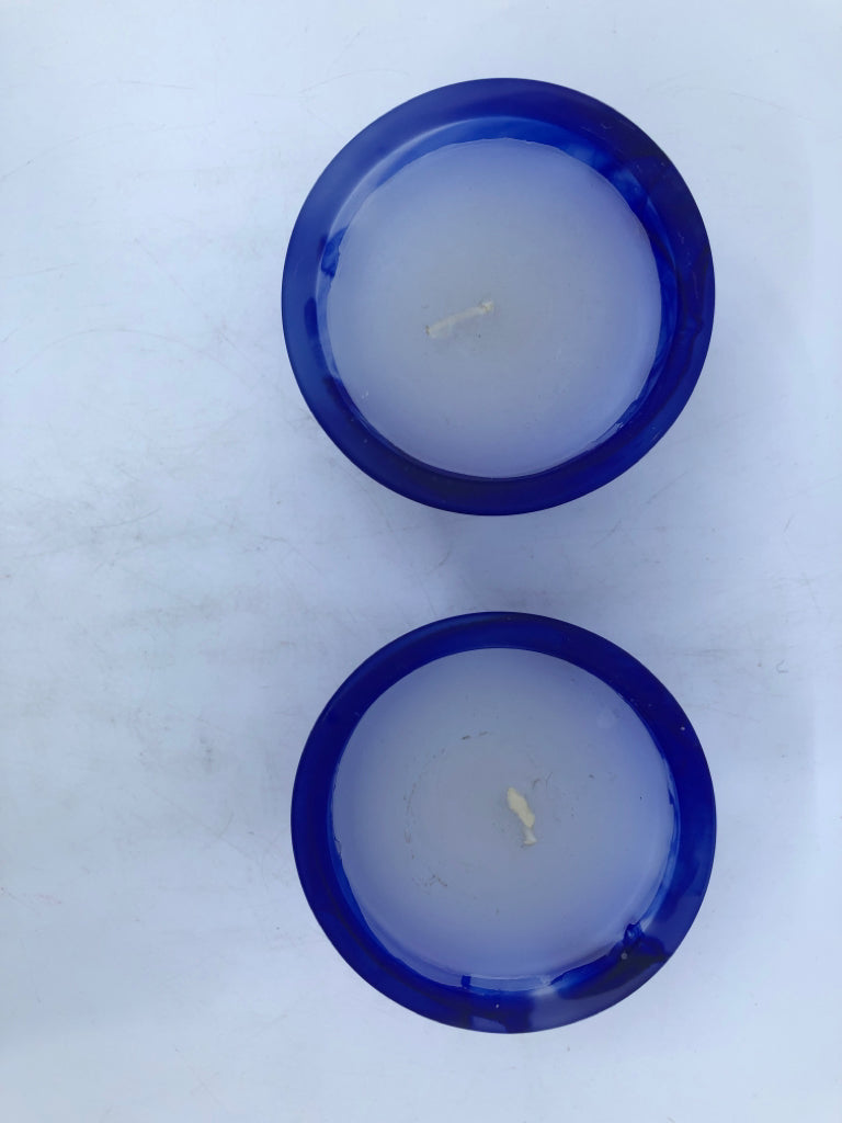 2 FROSTED COBALT BLUE CANDLES.