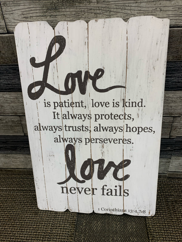 LOVE IS PATIENT WHITE WOOD WALL HANGING.