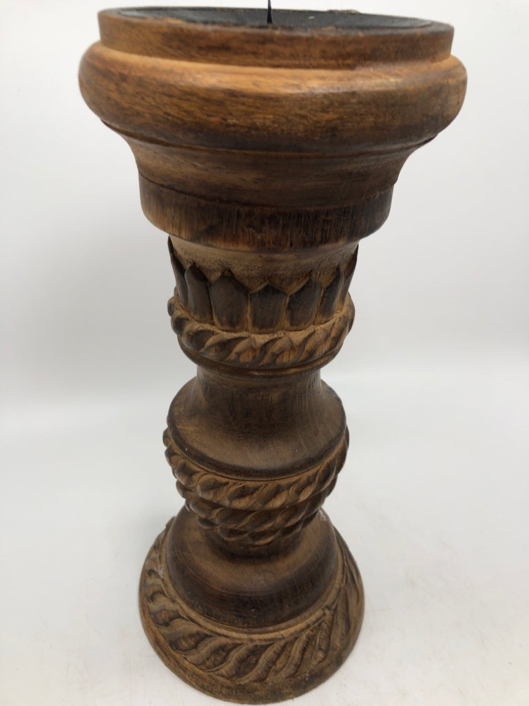 2 WOOD CARVED CANDLE HOLDERS W/BURNT FINISH.