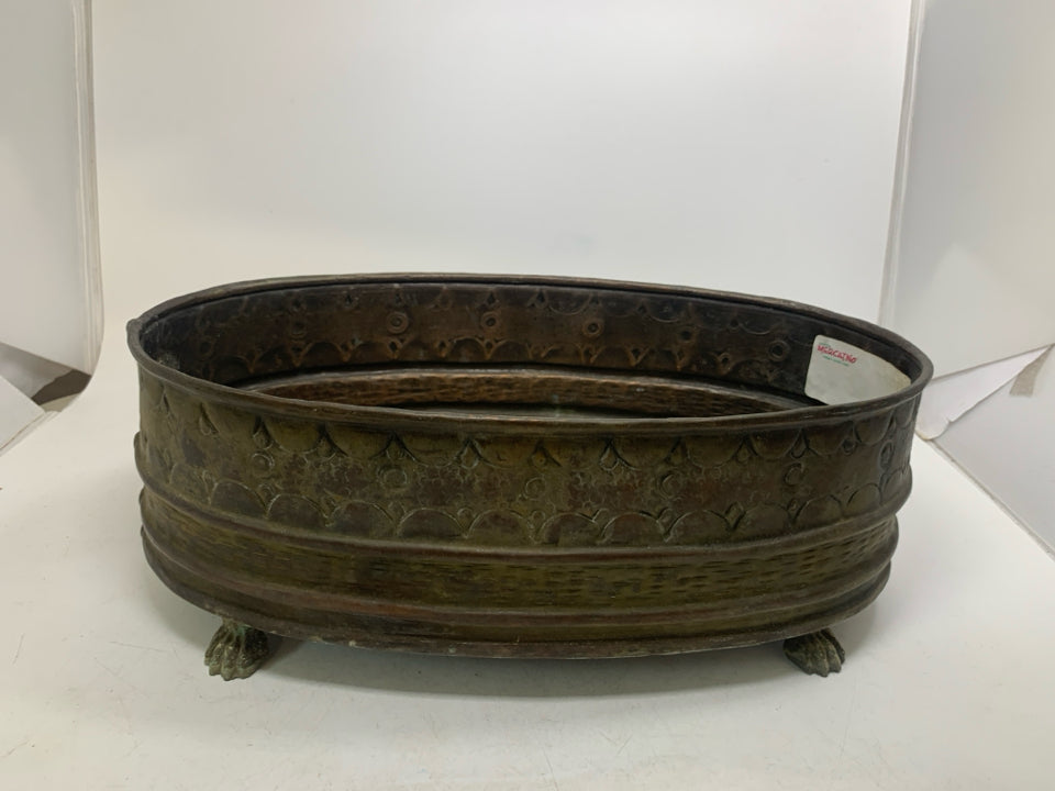 VTG FOOTED OVAL METAL PLANTER.