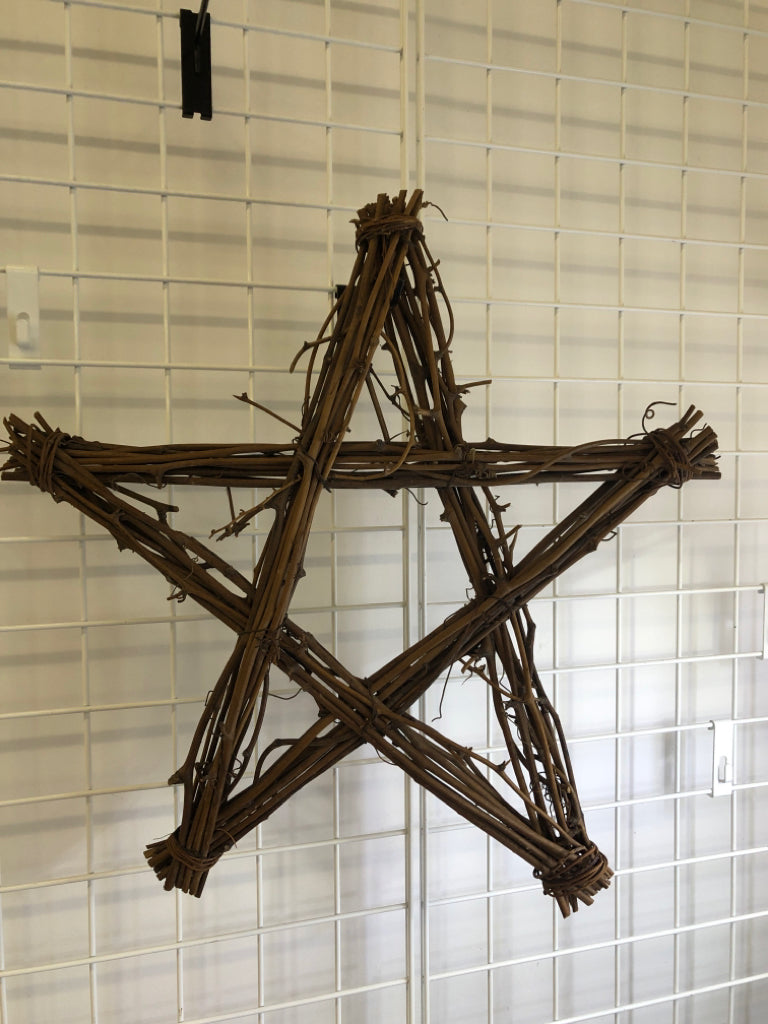 TWIG STAR SHAPED WALL HANGING.