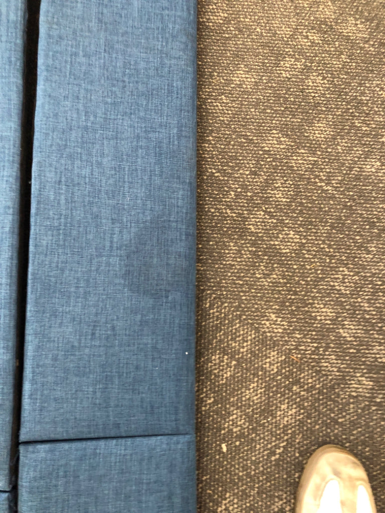 NAVY TWIN UPHOLSTERED FABRIC BED.