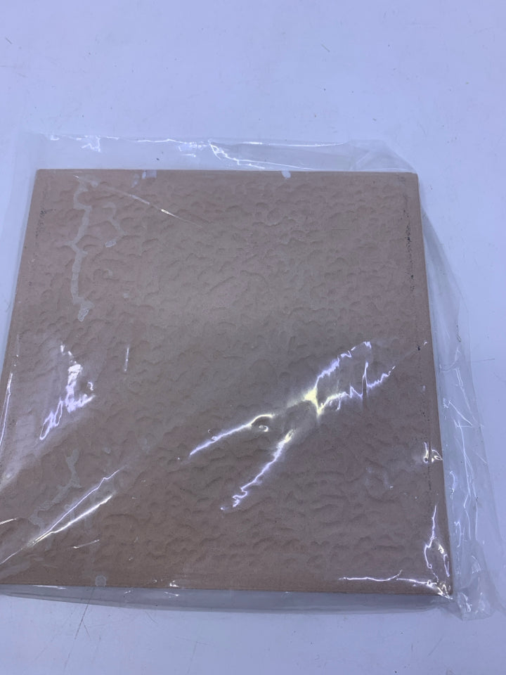 BROWN FLORAL SQUARE TILE.