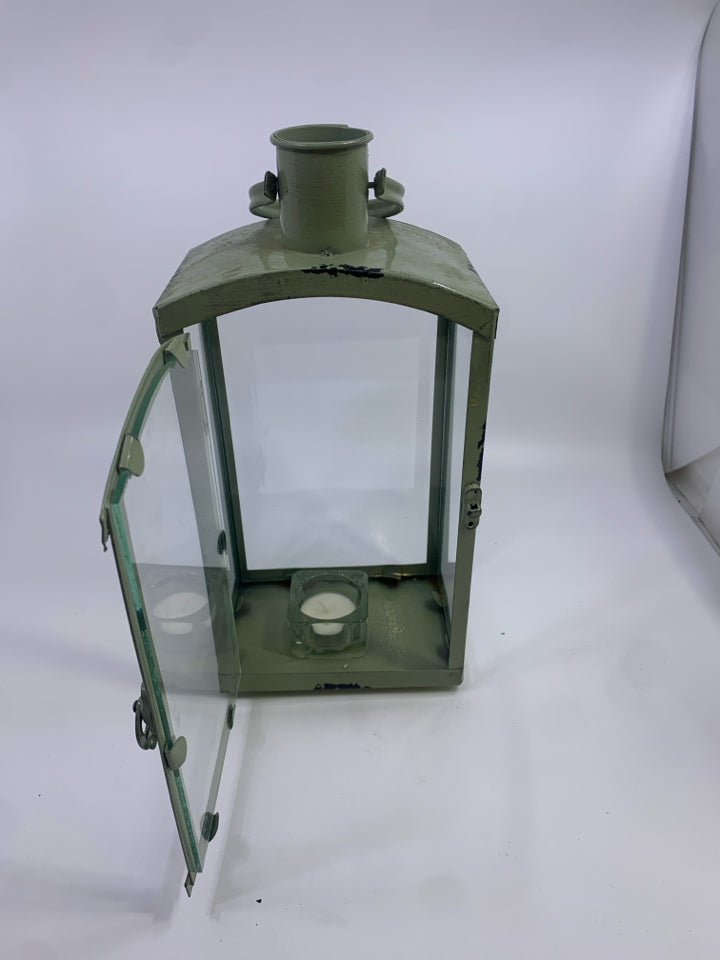GREEN METAL LANTERN.