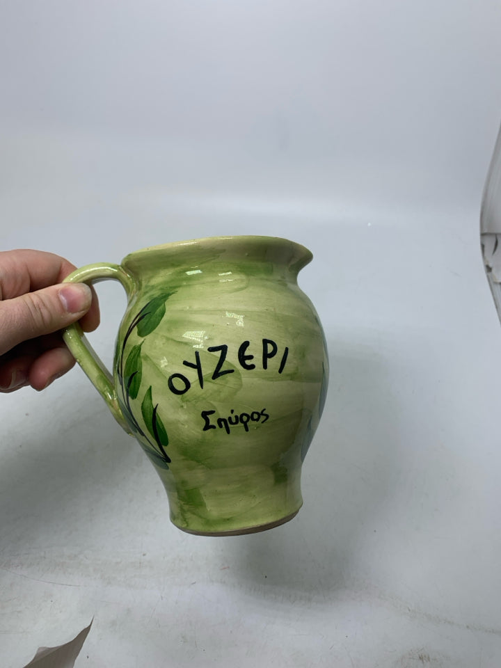LIGHT GREEN TERRA COTTA SCRIPT PITCHER.